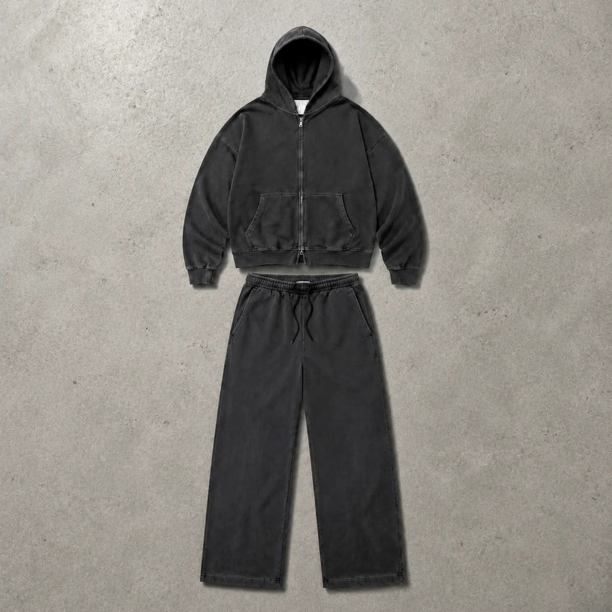 Apparel colorway flat lay on cement