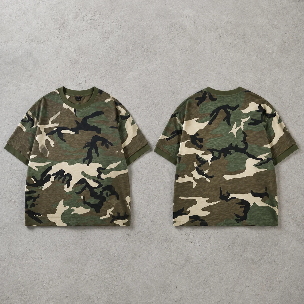 Apparel colorway flat lay on cement