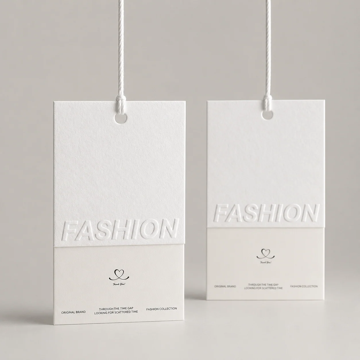 White embossed fashion hangtags with string