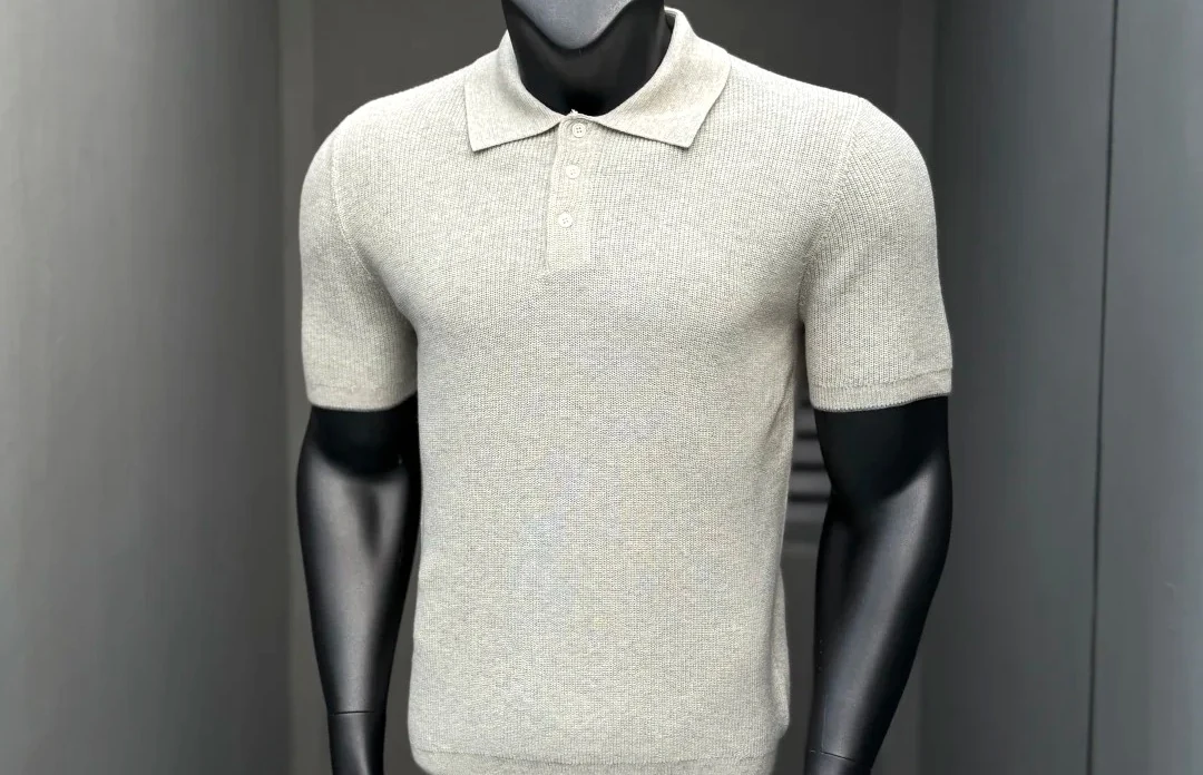 Premium knit polo on a mannequin