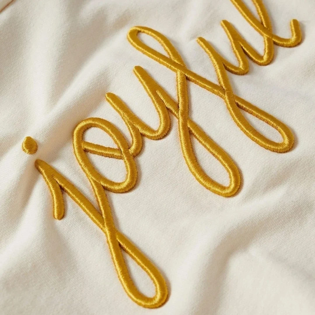Raised satin stitch embroidery