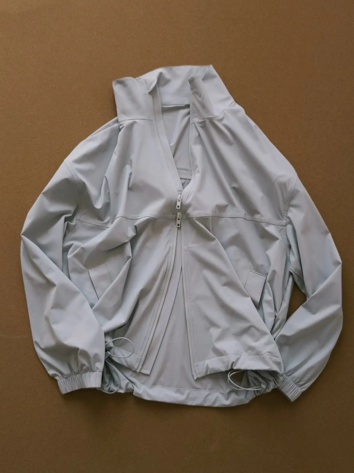 Outerwear sample on studio backdrop
